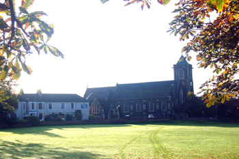 Hunt Hotel and Saint Barnabas seen from the Station October 2008